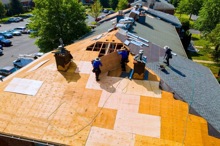 Workers installing roof