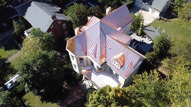 aerial view of a new metal roofing installation job